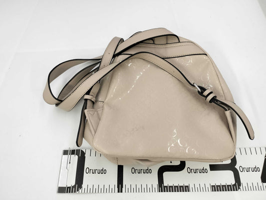 5 handbags including Coach and Guess