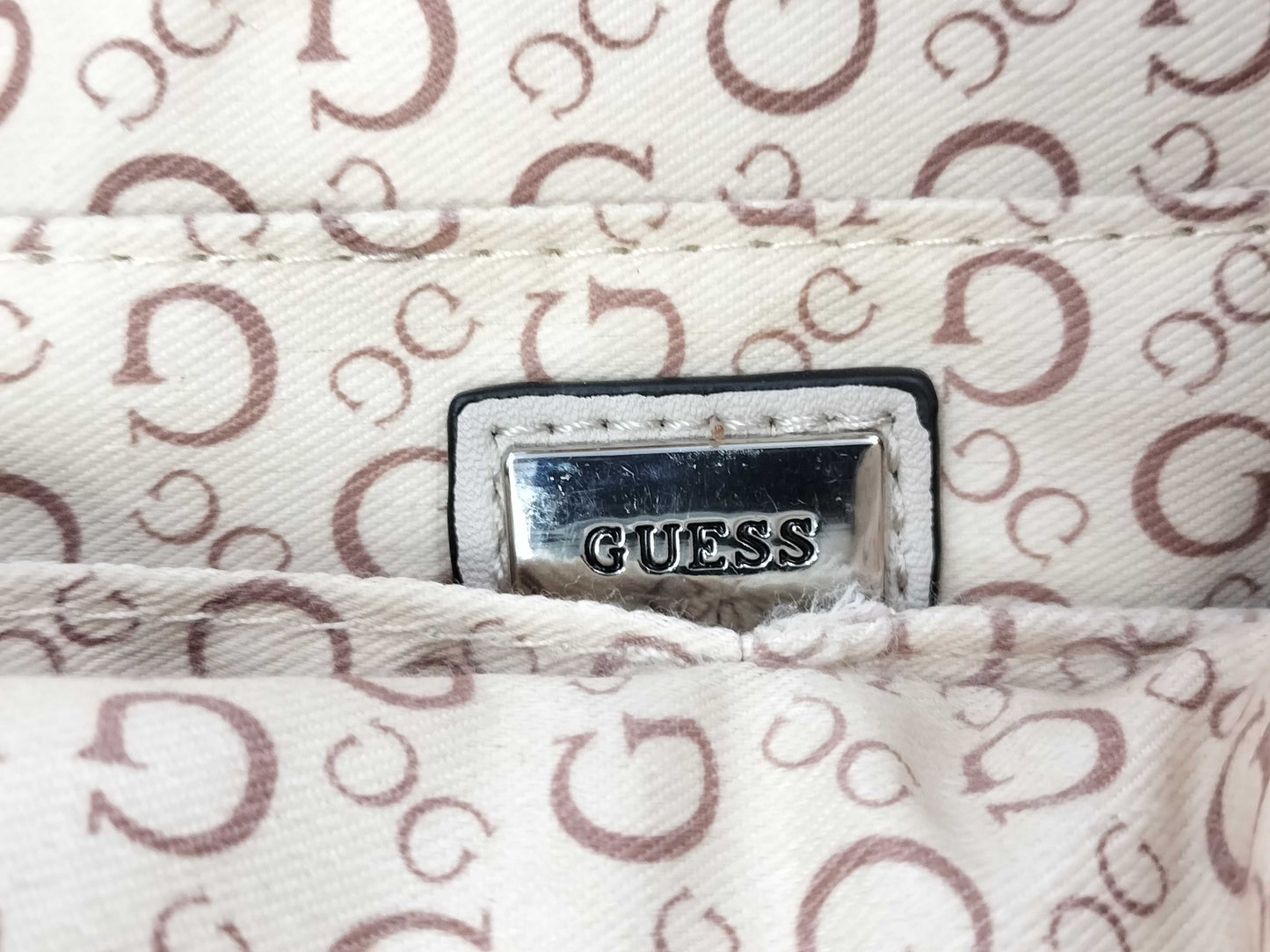 5 handbags including Coach and Guess
