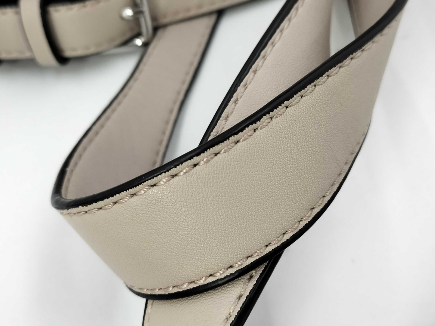 5 handbags including Coach and Guess