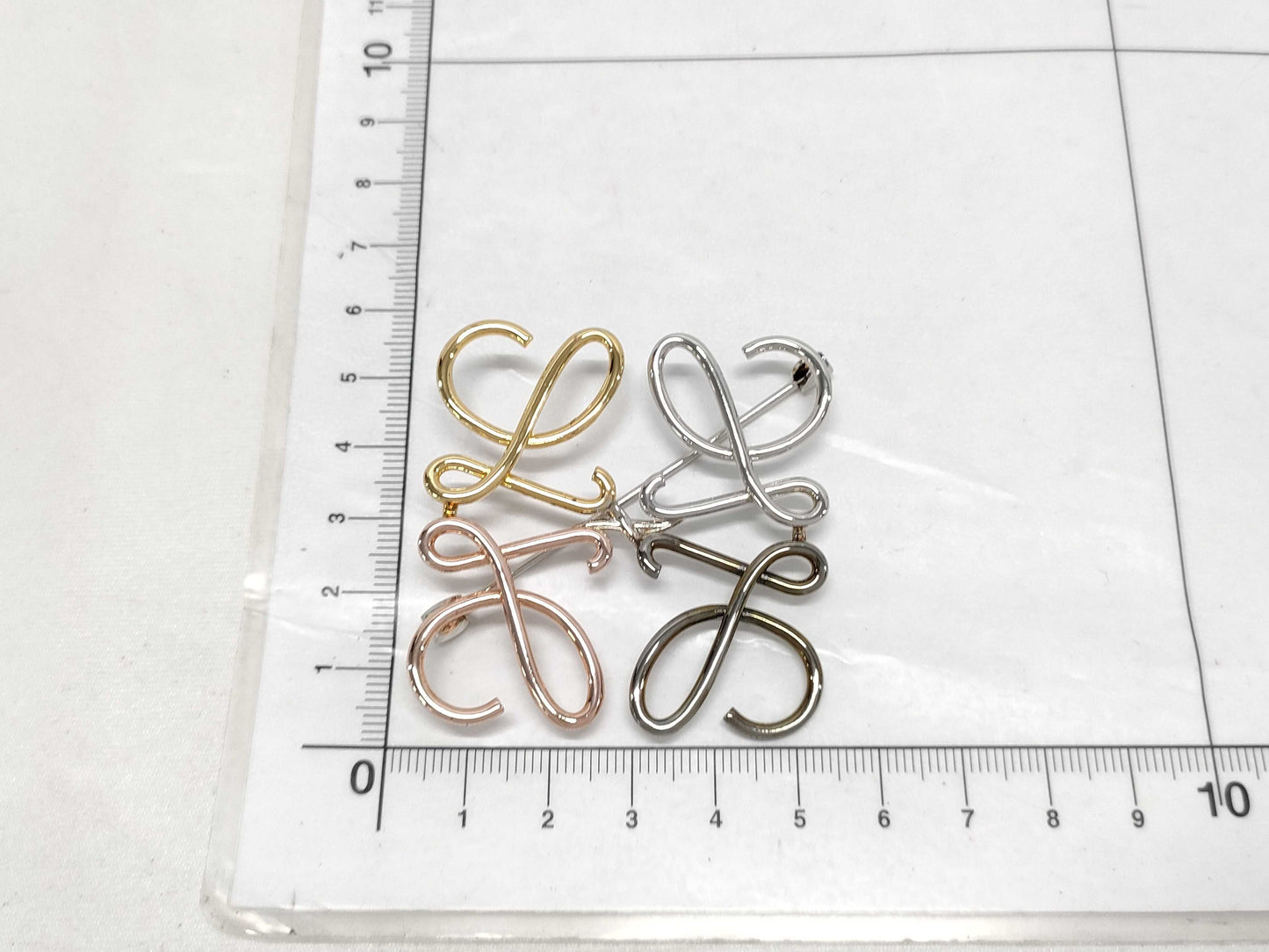 LOEWE Anagram Brooch