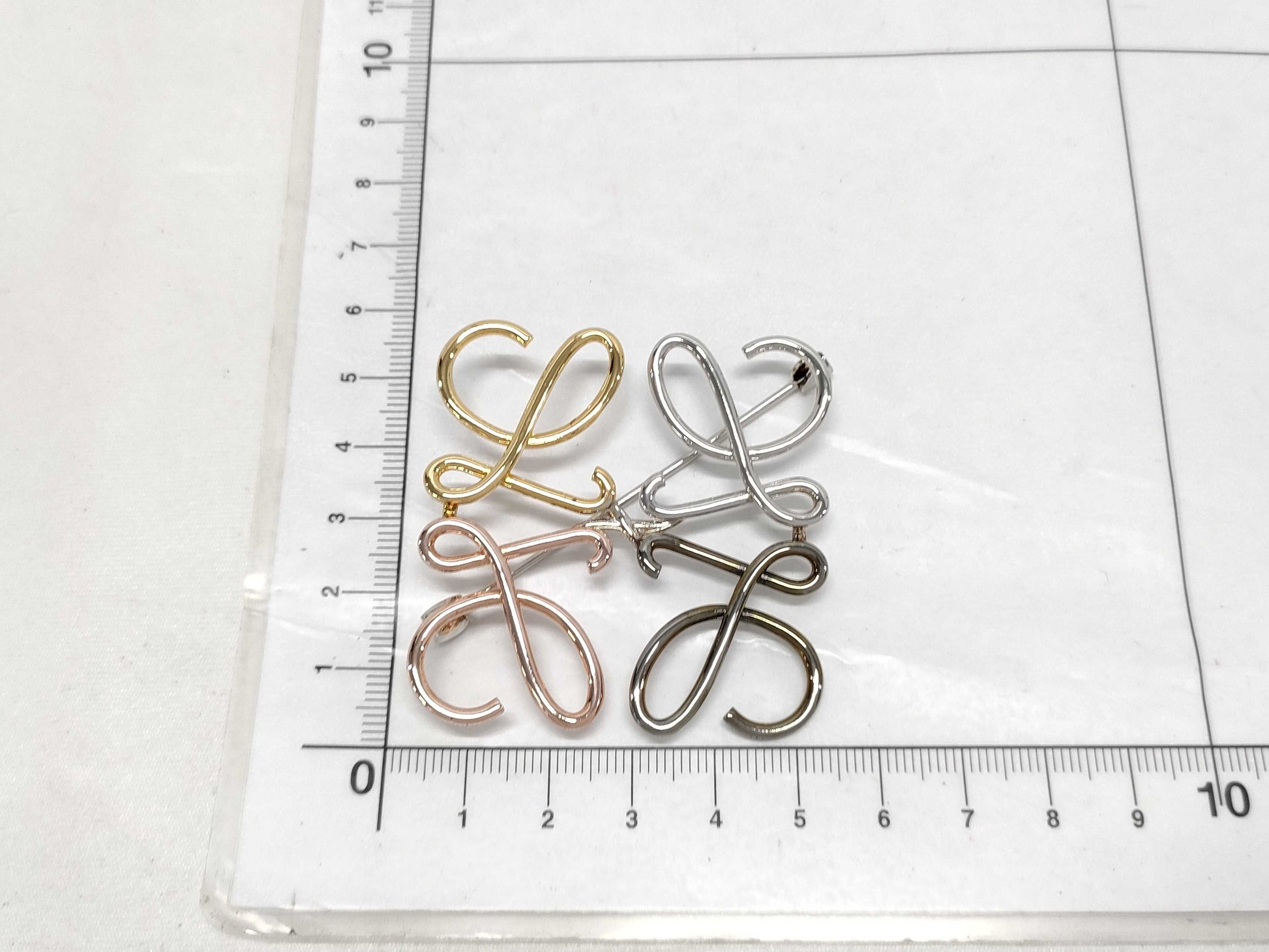 LOEWE Anagram Brooch