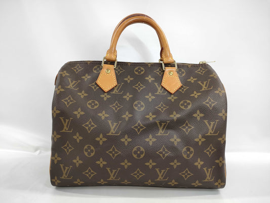 LOUIS VUITTON Monogram Speedy Handbag with Broken Zipper Pull