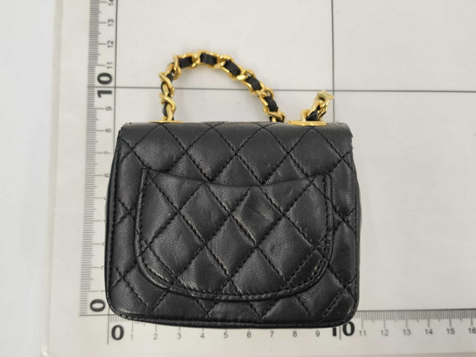 CHANEL Lambskin Mini Matelasse Shoulder Bag with Chain Belt
