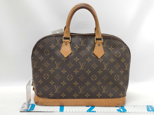 LOUIS VUITTON Monogram Alma Handbag