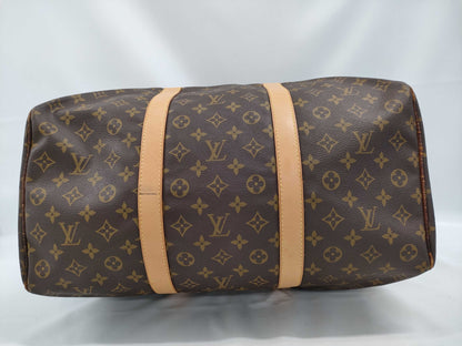 LOUIS VUITTON Monogram Sax Souple Boston Bag