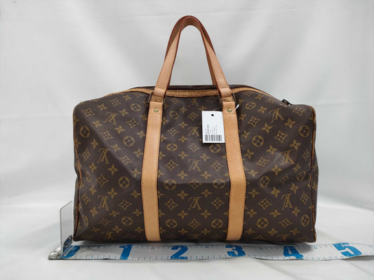 LOUIS VUITTON Monogram Sax Souple Boston Bag
