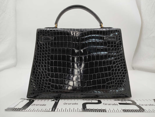 HERMES Kelly 32 Black Crocodile Leather Handbag with Gold Hardware and 〇I Stamp