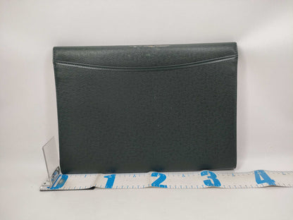 LOUIS VUITTON Taiga flap-style second bag with some deterioration inside the pocket.