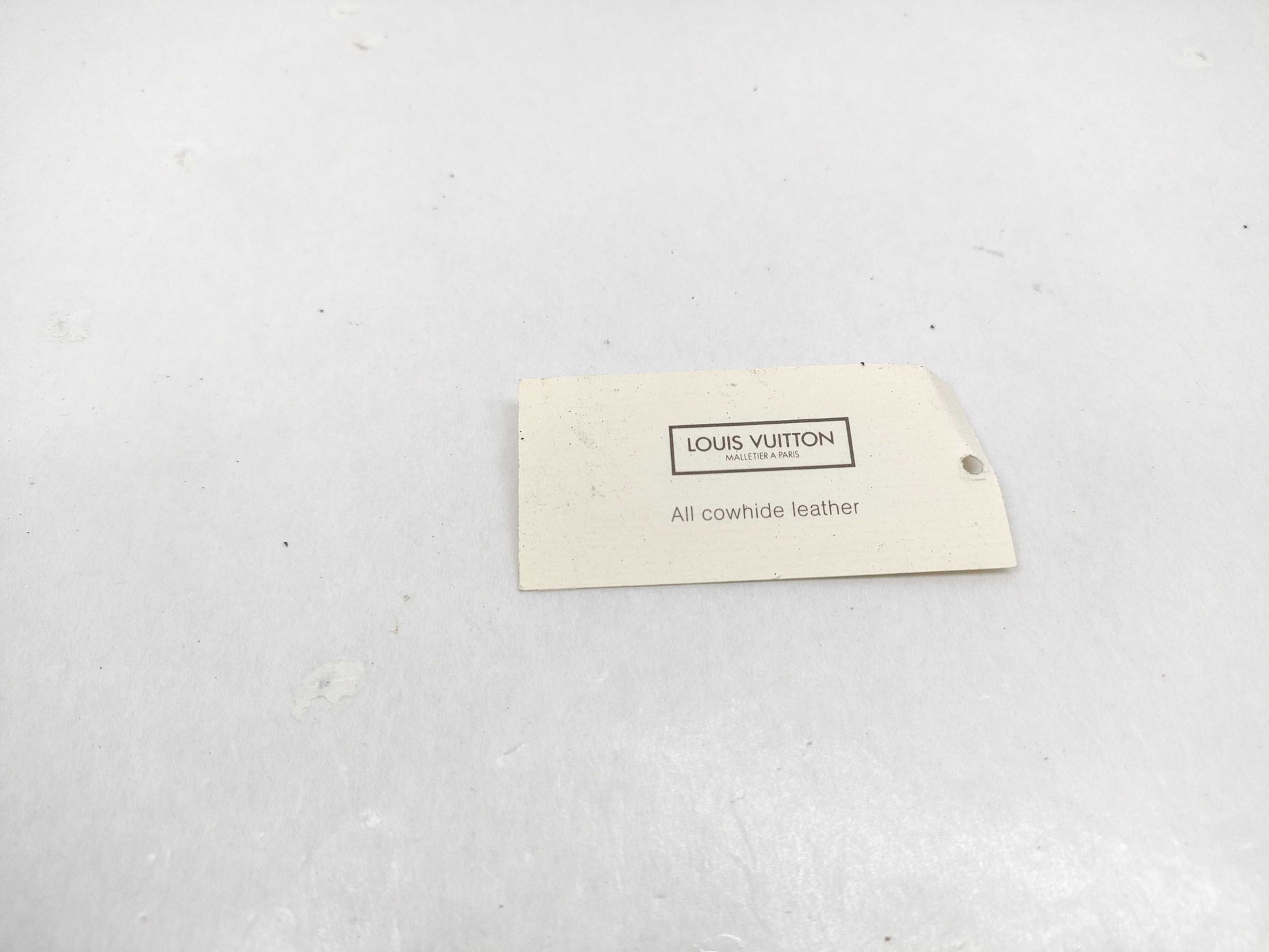 LOUIS VUITTON Taiga flap-style second bag with some deterioration inside the pocket.