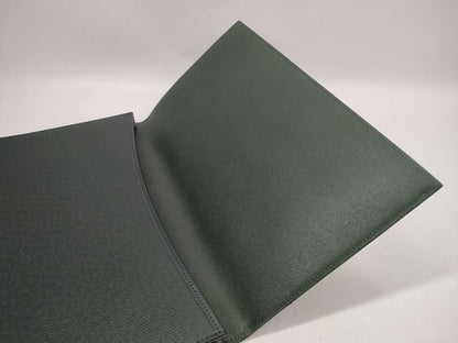 LOUIS VUITTON Taiga flap-style second bag with some deterioration inside the pocket.