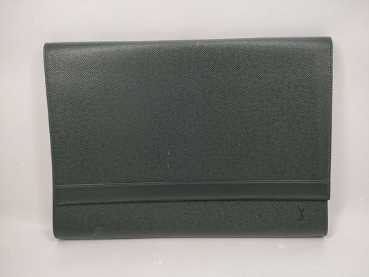LOUIS VUITTON Taiga flap-style second bag with some deterioration inside the pocket.