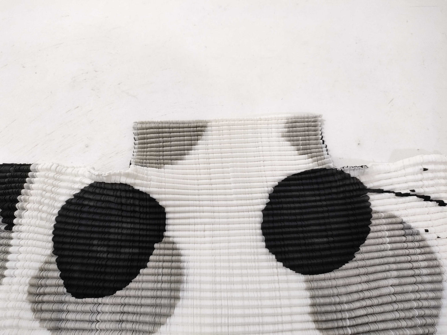 ISSEY MIYAKE cut and sew patterned top