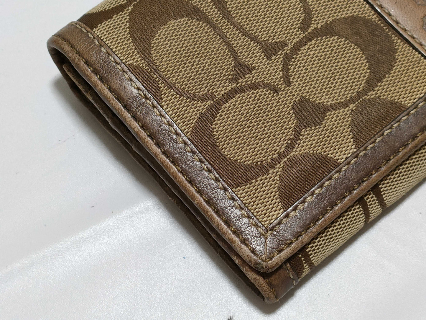 5-piece wallet set including COACH and Cartier