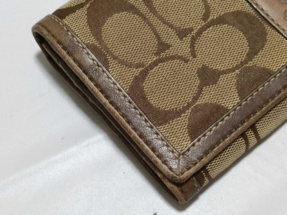 5-piece wallet set including COACH and Cartier
