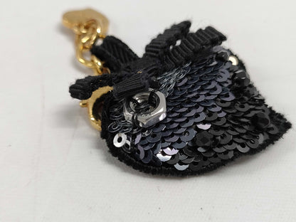 PRADA Charms and other accessories