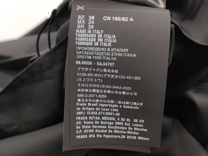 PRADA Skirt with nylon belt and triangle plate, black skirt