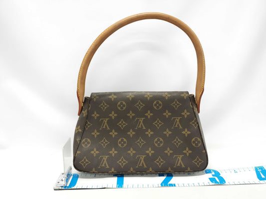 LOUIS VUITTON Monogram Mini Looping Handbag with Mildew