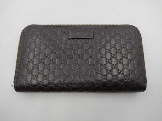 GUCCI Microsima GG Round Zip Wallet in Dark Brown