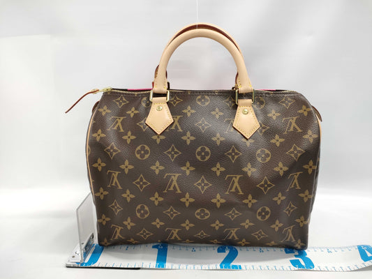 LOUIS VUITTON Monogram M41533/DU1105 V-Line Limited Edition Handbag