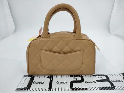 CHANEL Mini Boston Caviar Matlasse Handbag