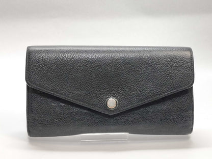 LOUIS VUITTON Monogram Empreinte Giant Monogram Reverse Portefeuille Zoe Wallet