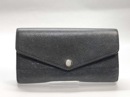 LOUIS VUITTON Monogram Empreinte Giant Monogram Reverse Portefeuille Zoe Wallet