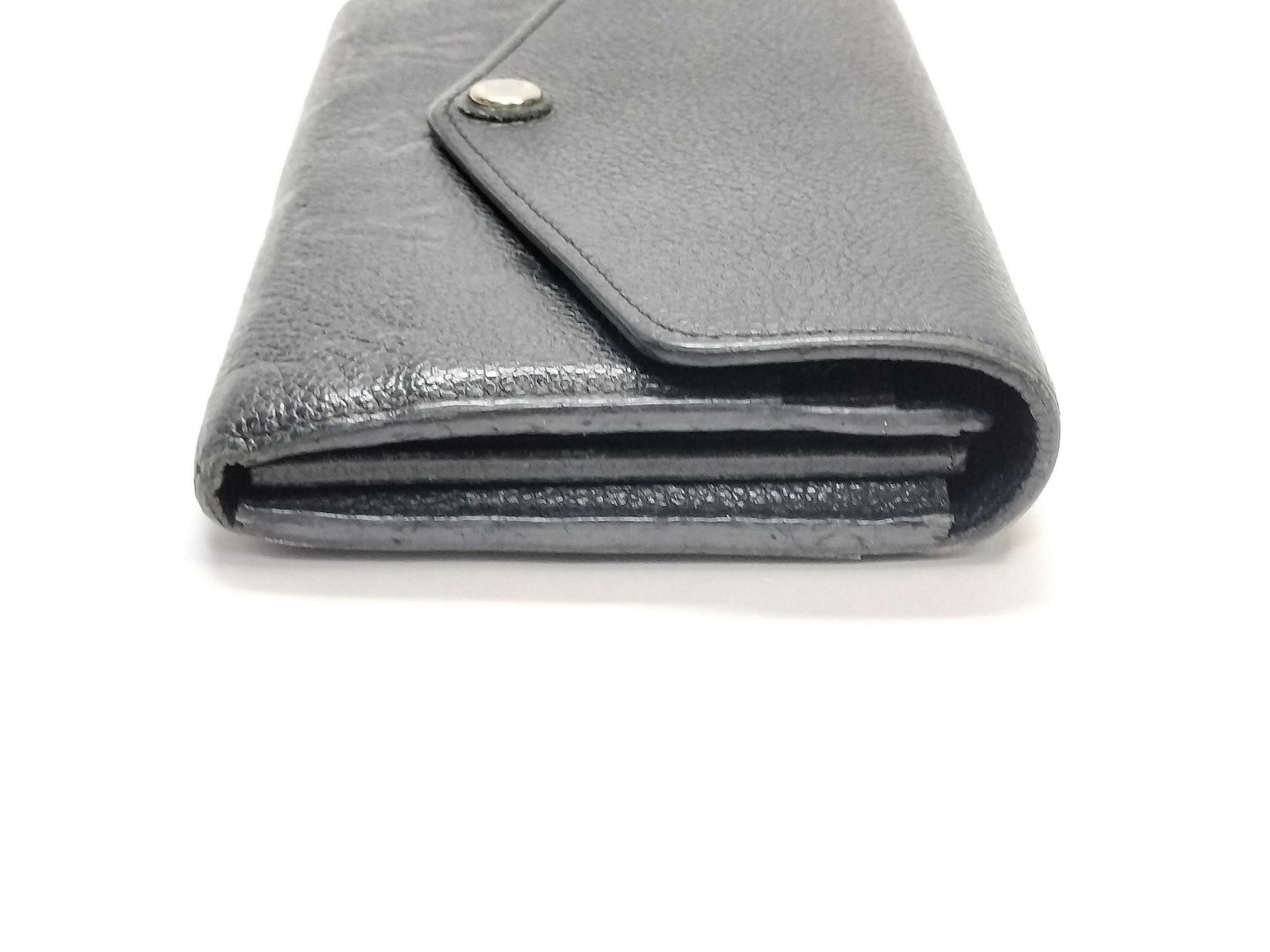 LOUIS VUITTON Monogram Empreinte Giant Monogram Reverse Portefeuille Zoe Wallet