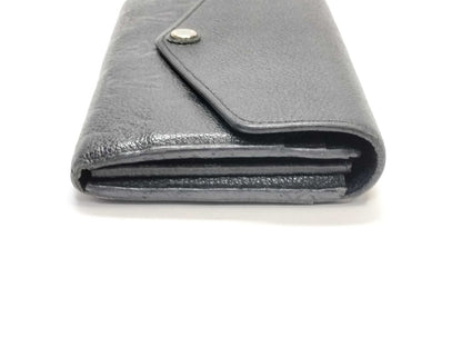 LOUIS VUITTON Monogram Empreinte Giant Monogram Reverse Portefeuille Zoe Wallet