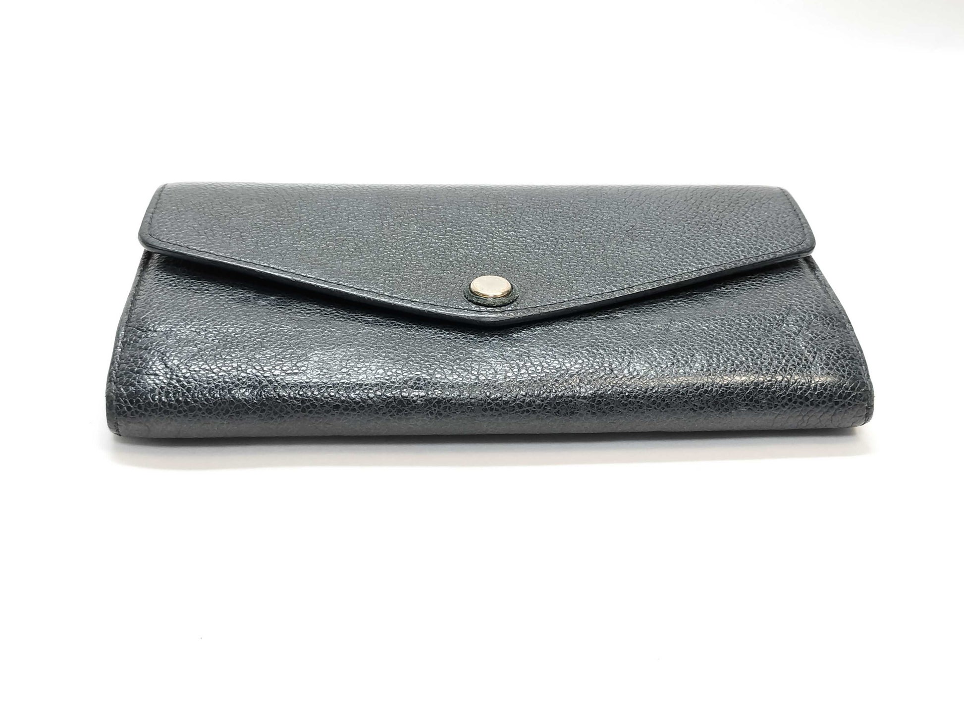 LOUIS VUITTON Monogram Empreinte Giant Monogram Reverse Portefeuille Zoe Wallet