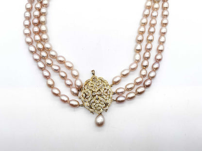 Pearl necklace with a diameter of approximately 7.4mm-8.9mm and diamonds, weighing 94.4g in 14K gold.