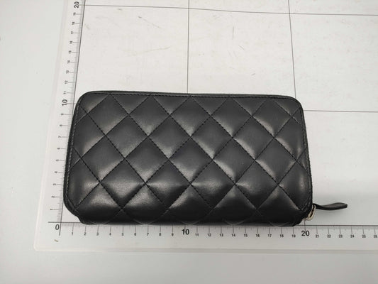 CHANEL Lambskin Round Zip Wallet