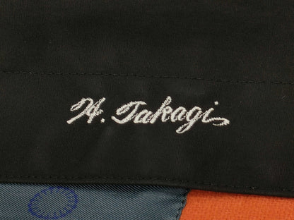 Mackintosh coat with name