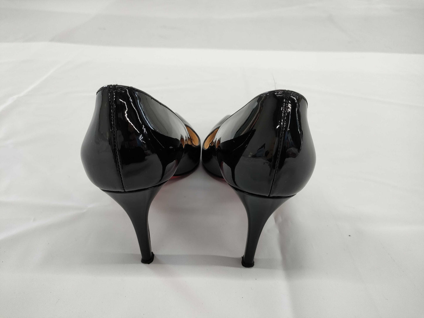 Christian Louboutin Enamel Pointed Toe Stiletto Heel Pumps