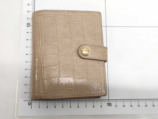 Miu Miu Embossed Compact Wallet Wallet