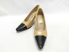 CHANEL Leather/Coco Button Pumps