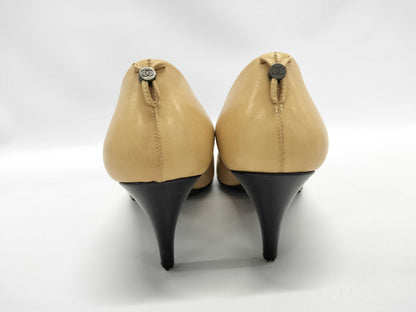 CHANEL Leather/Coco Button Pumps