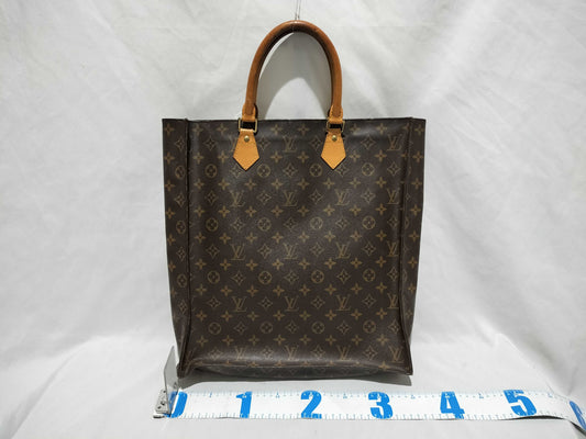 LOUIS VUITTON Monogram Sack Plastic Handbag