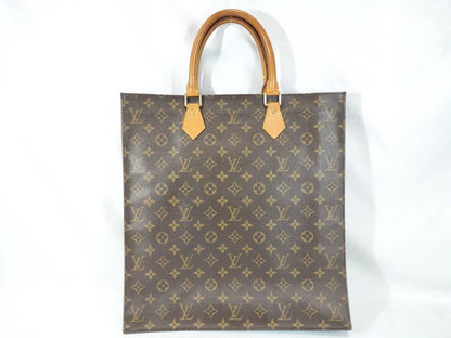 LOUIS VUITTON Monogram Sack Plastic Handbag