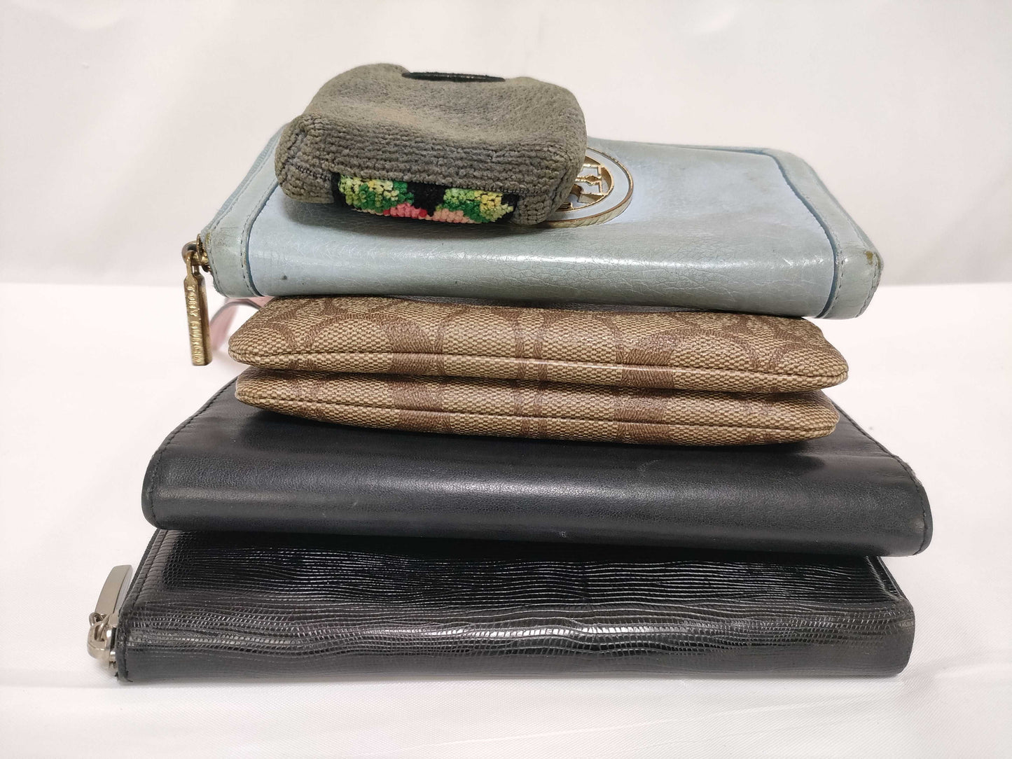 5-piece clothing accessory set including wallets from Feiler, Tory Burch, Furla, Coach, etc.