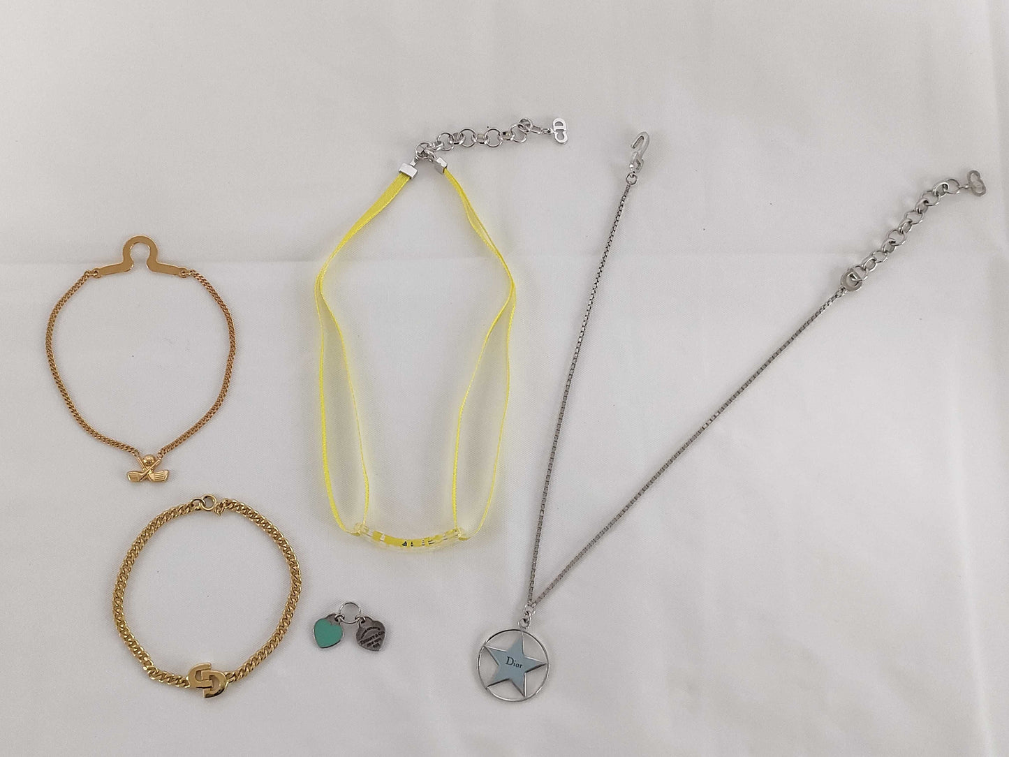 Dior Star Necklace/Choker, Tiffany Return to Charm, Ferragamo Bracelet, etc. Necklace Set