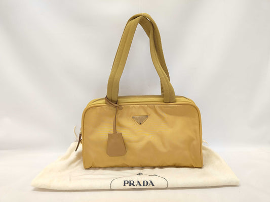 PRADA nylon handbag with triangle logo, yellow