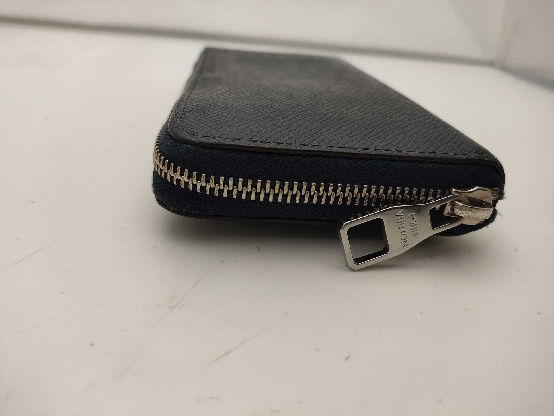 LOUIS VUITTON Taiga Zippy Vertical Wallet