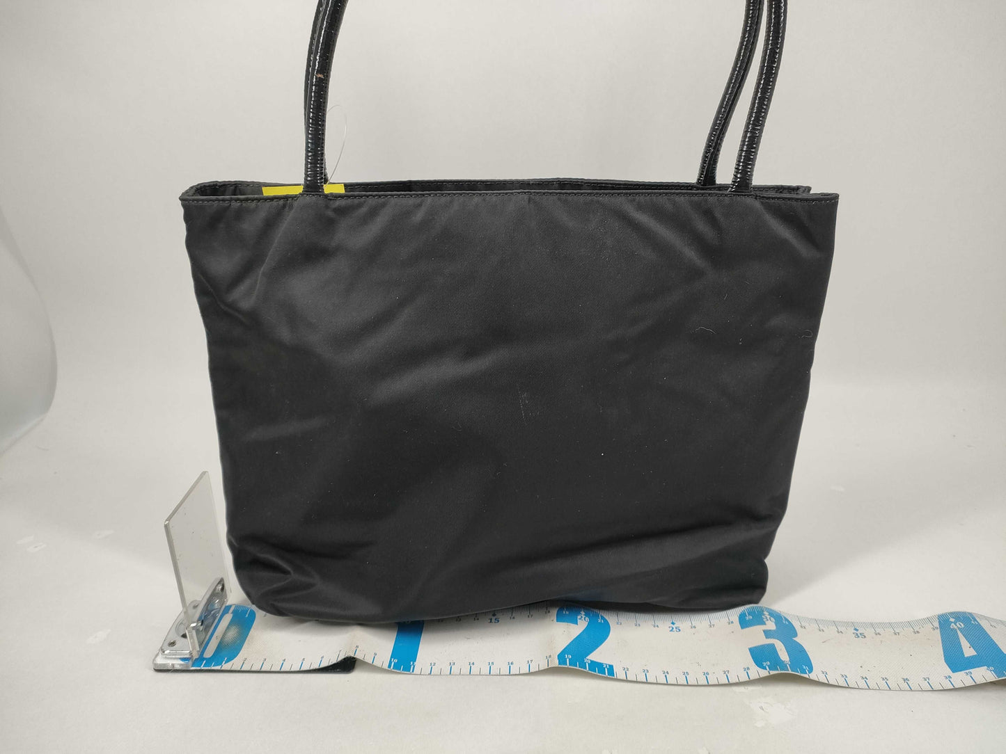 PRADA Nylon Leather Accessory Triangle Tote Bag in Black and Gold