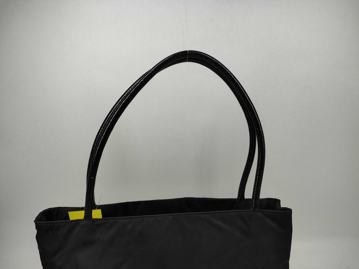 PRADA Nylon Leather Accessory Triangle Tote Bag in Black and Gold