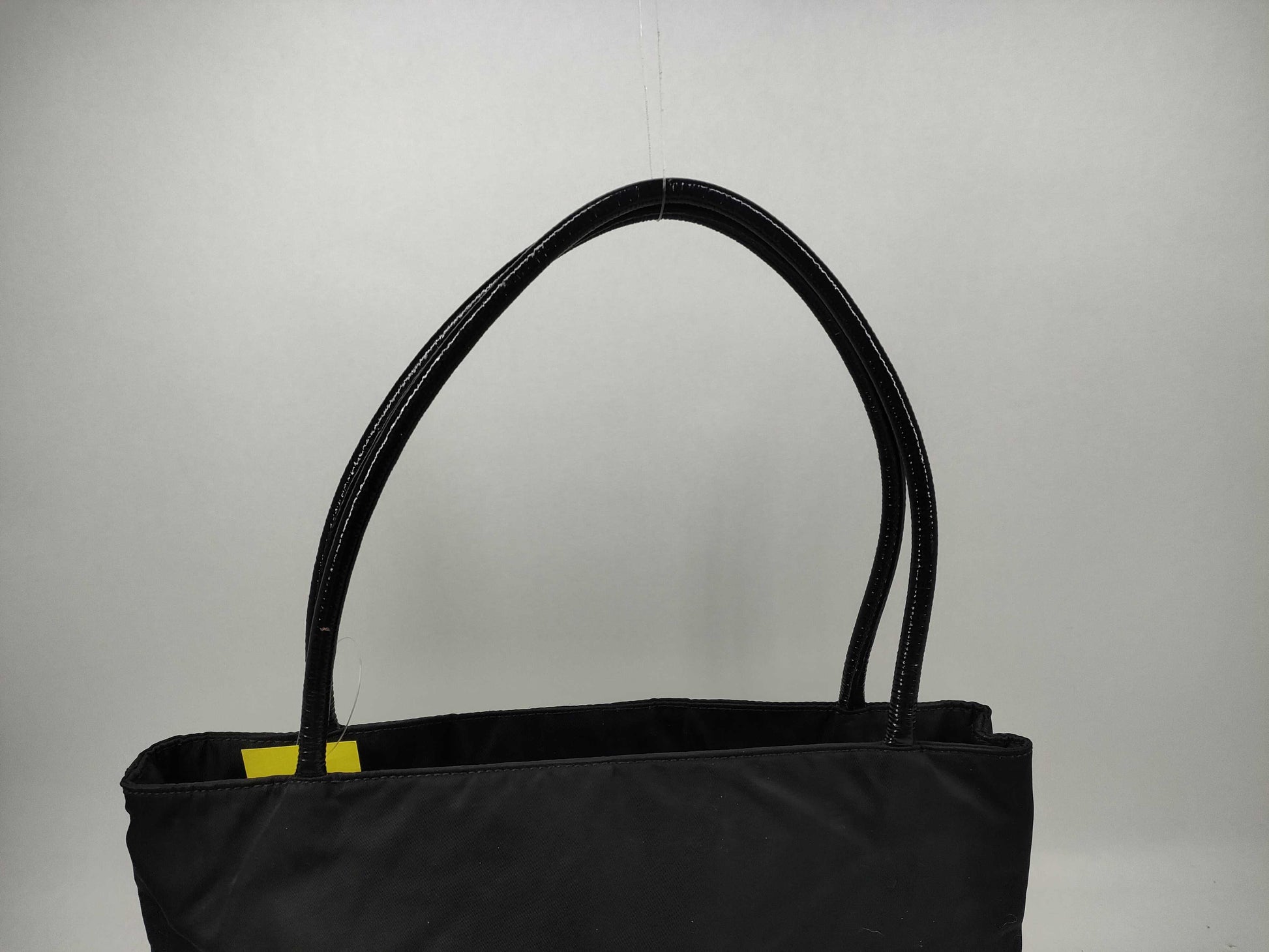 PRADA Nylon Leather Accessory Triangle Tote Bag in Black and Gold