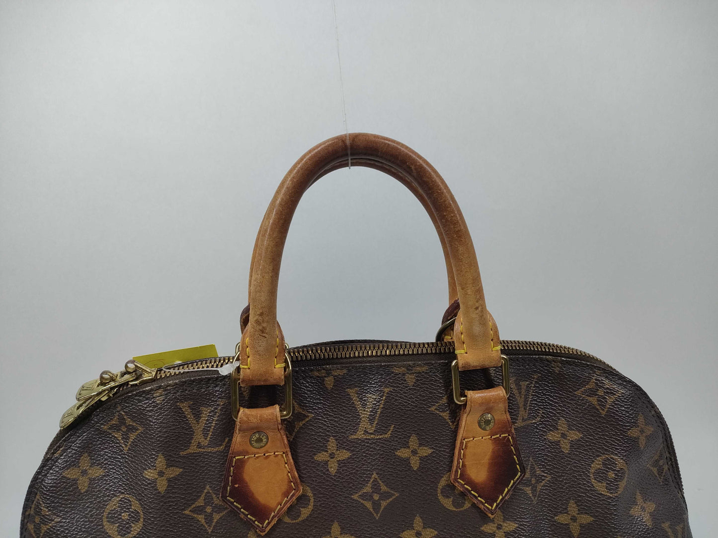 LOUIS VUITTON Monogram Alma Handbag