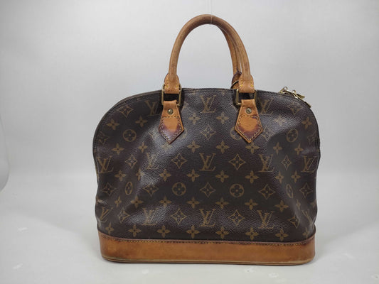 LOUIS VUITTON Monogram Alma Handbag