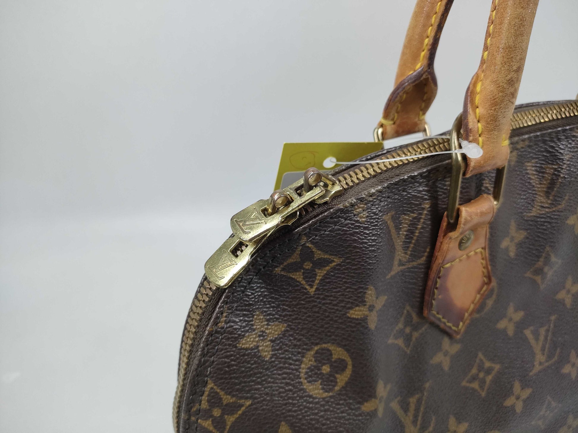 LOUIS VUITTON Monogram Alma Handbag