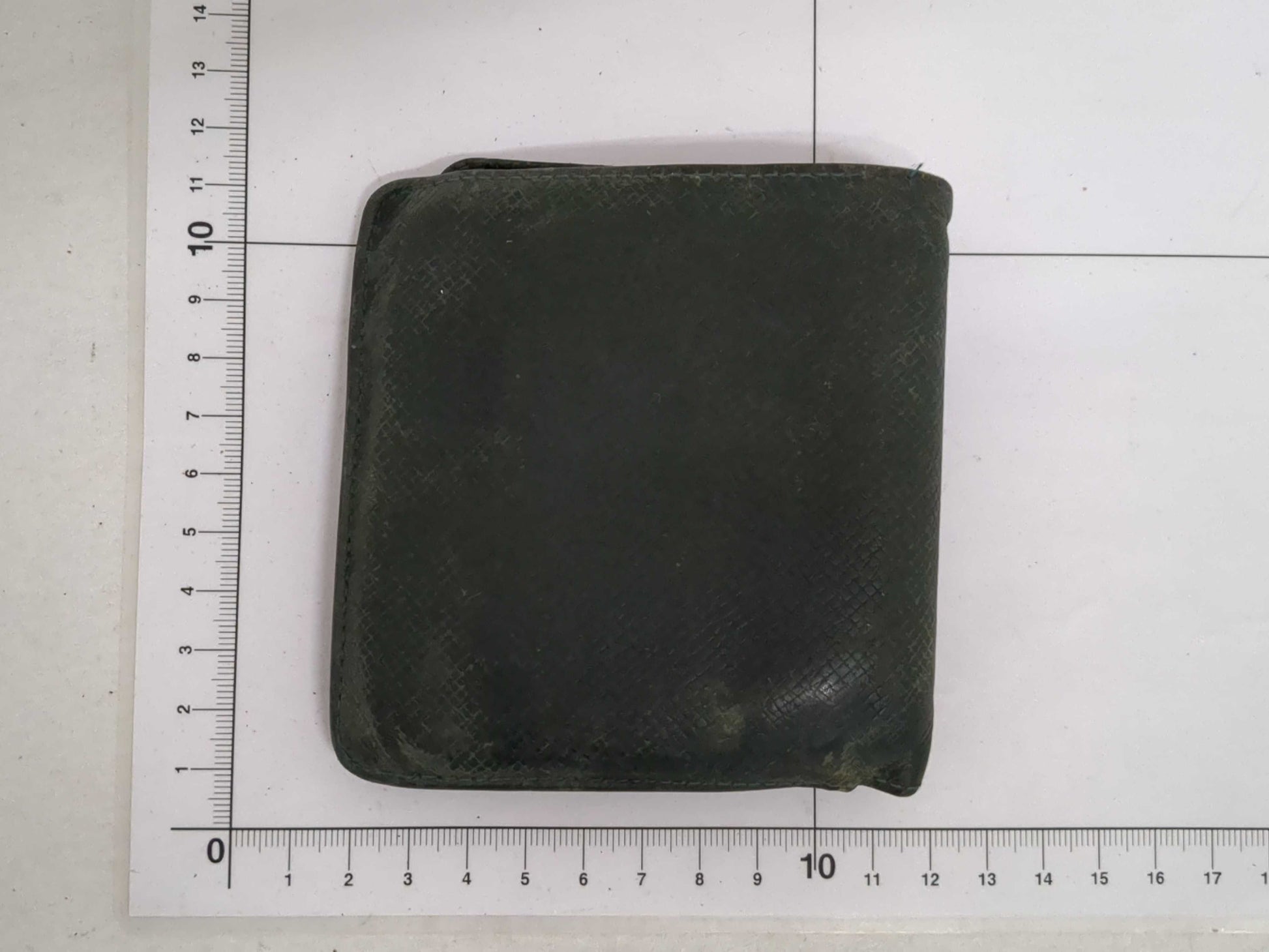 Salvatore Ferragamo, Louis Vuitton, and other wallets