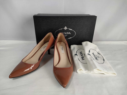 PRADA enamel pumps with box